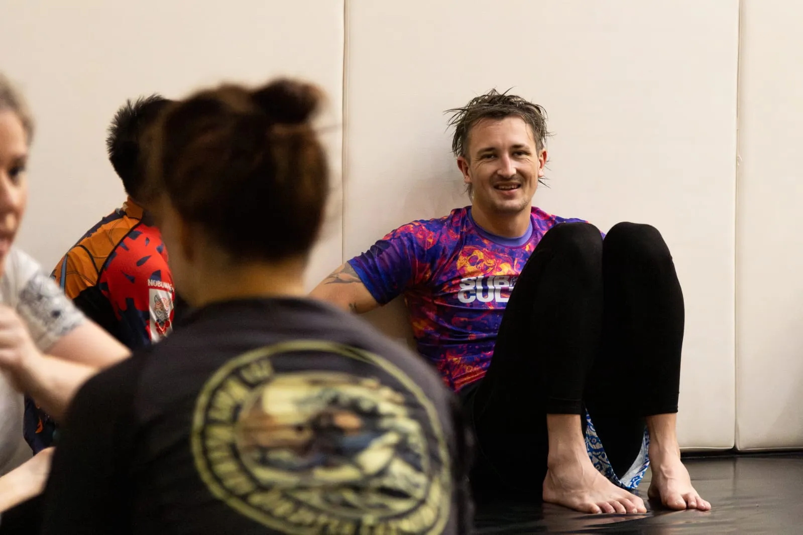 BJJ sparring session with professional instruction