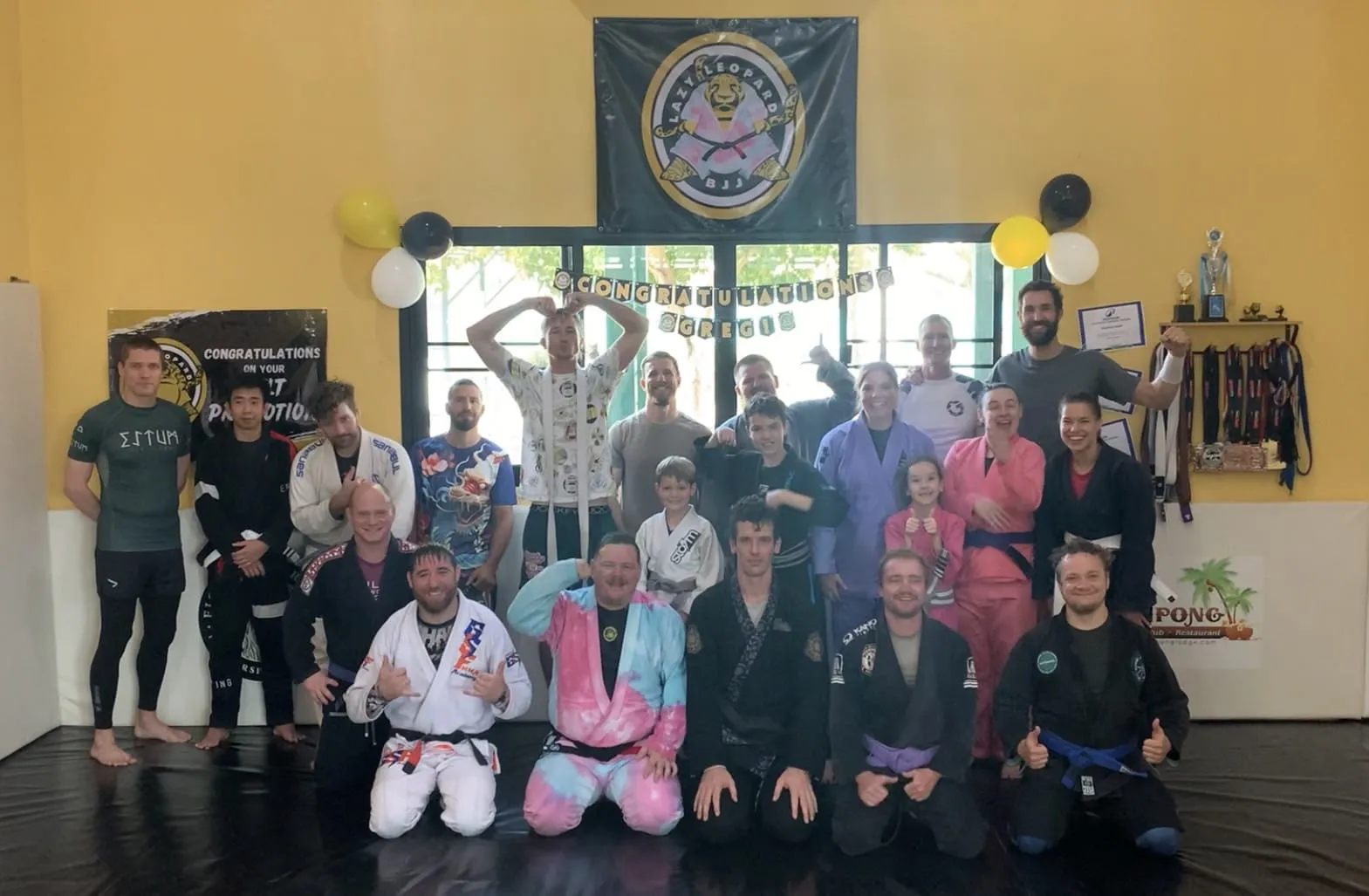 BJJ students practicing techniques at Lazy Leopard BJJ gym