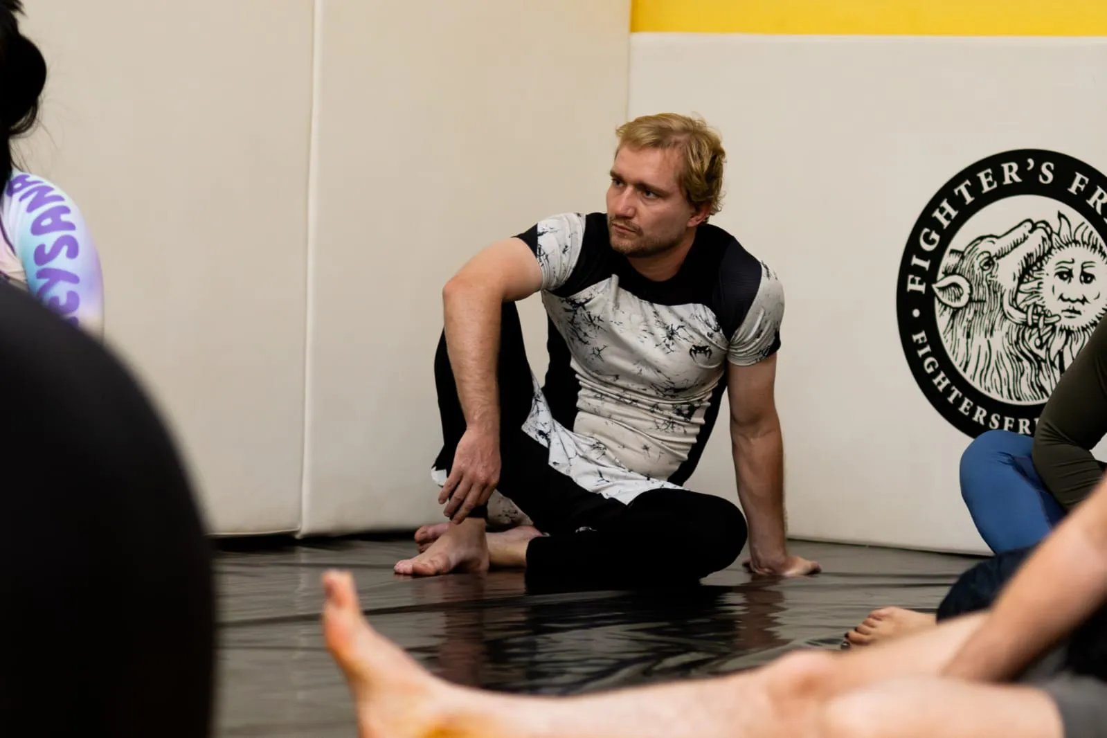 Brazilian Jiu-Jitsu students learning new techniques